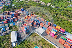 Aerial view of container cargo ship in the export and import business and logistics international goods in urban city. Shipping to