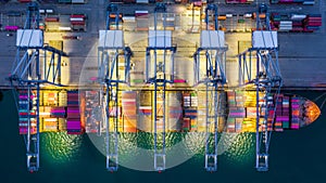 Aerial view container cargo ship at night, import export commerce global business logistic and transportation of International by