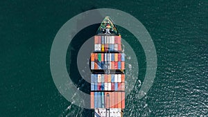 Aerial view container ship carrying container box global business cargo freight shipping commercial trade logistic and