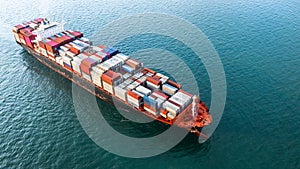 Aerial view container ship carrying container in import export business logistic and transportation of international by container