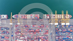 Aerial view container ship and container warehouse from sea port for delivery containers shipment. Suitable use for transport or