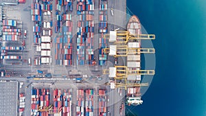 Aerial view container ship from sea port warehouse waiting for delivery containers shipment. Suitable use for transport or import