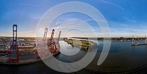 Aerial view of a container terminal in the port of Hamburg at sunset