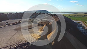 Aerial view of a conveyor in salt pits, mining of potash and salt, conveyor line in working process, salt quarries