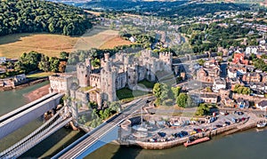 Aerial view with Conwy town and the medieval castle, the famous landmark of Wales and UK,