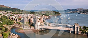 Aerial view with Conwy town and the medieval castle, the famous landmark of Wales and UK,