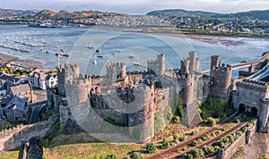 Aerial view with Conwy town and the medieval castle, the famous landmark of Wales and UK,