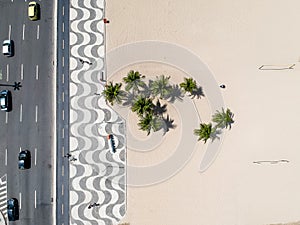 Aerial view of Copacabana beach during summer, sun with clouds.