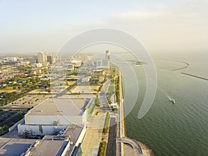 Aerial view Corpus Christi waterfront with sailboat along Shoreline Boulevard