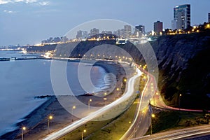 view of costa verde bajada armendariz modern and luxurious buildings at night miraflores beaches lima peru photo