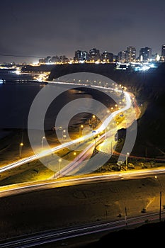 view of costa verde bajada armendariz modern and luxurious buildings at night miraflores beaches lima peru photo