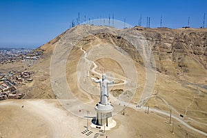 Aerial view of Cristo del Pacifico and Morro Solar hill in the background photo