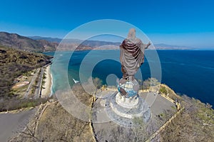 Aerial view of Cristo Rei of Dili, high statue of Jesus Christ located atop a globe in Dili city, East Timor. Timor-Leste.