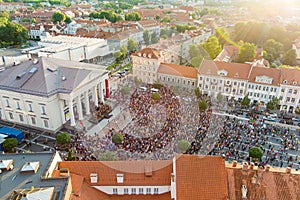 Aerial view of crowds celebrating Lithuanian Statehood Day. Lots of people singing national anthem of Lithuania