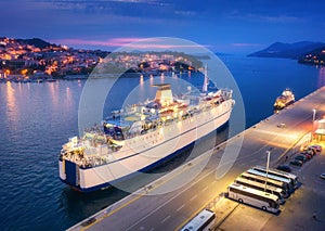 Aerial view of cruise ship at harbor at night