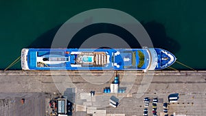 Aerial view cruise ship parking the pier, Cruise ship at harbor. Aerial view beautiful large white ship, Top view from drone of