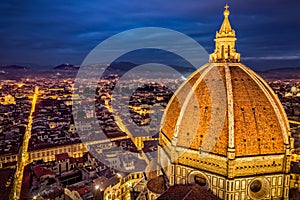 Aerial view of Cupola of Florence Duomo and Florence City at Dusk
