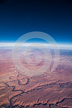 Aerial View of Curvature of Earth across Red Desert