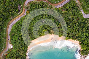 Aerial view of curve road along the seashore at Phuket Thailand beautiful seacoast and open sea in summer season Nature recovered