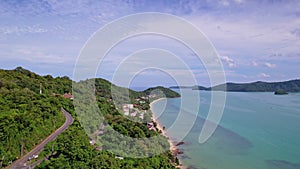 Aerial view of curve road along the seashore at Phuket Thailand beautiful seacoast and open sea in summer season Nature recovered