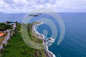 Aerial view of curve road along the seashore at Phuket Thailand, Beautiful seacoast view at open sea in summer season, Nature