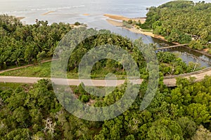 Aerial view of curve road along the seashore at Trang Thailand