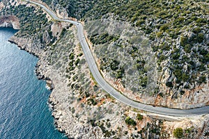 Aerial view of curves coastline road alonge sea