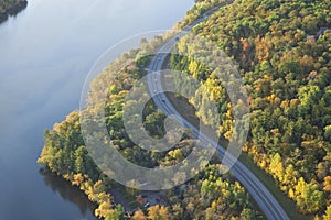 Aerial view of curving road along Mississippi River in northern Minnesota during autumn