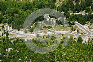 Aerial view of curvy road in the Albanian Alps mountain