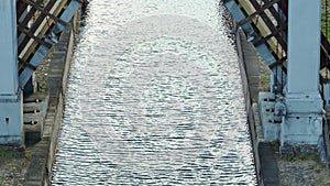 aerial view on dam lock sluice on river impetuous waterfall. surface or expanse of water