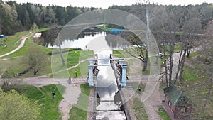 aerial view on dam lock sluice on river impetuous waterfall. surface or expanse of water