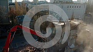 Aerial view of demolition site. Process of demolition of old industrial building