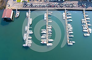 Aerial view of the Depoe Bay, Oregon harbor, Marina, dock and pier and fishing boats,