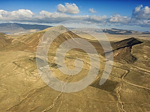 Aerial view of a desert landscape on the island of Lanzarote, Canary Islands, Spain. Mountains of the village of Soo and Famara