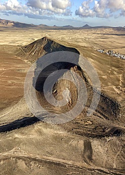 Aerial view of a desert landscape on the island of Lanzarote, Canary Islands, Spain. Mountains of the village of Soo and Famara