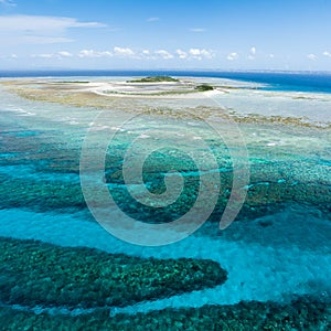 Aerial view of deserted tropical island photo