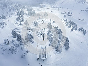 aerial view diffused light over ski lift in hahnenkamm ski resort