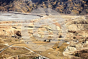 An aerial view of an open pit copper mine