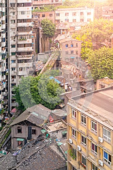 Aerial view of dirty city slum with old unfunctional ground cable car way in Chongqing, China
