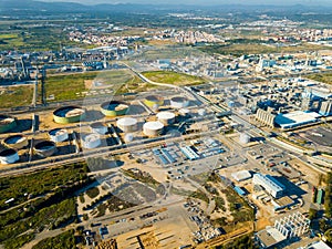 Aerial view of district near Reus city with chemical plant photo