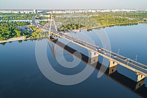 Aerial view of Dnipro river and Moskovskiy bridge in Kyiv, Ukraine