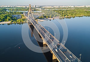 Aerial view of Dnipro river and Moskovskiy bridge in Kyiv, Ukraine