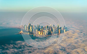 Aerial view of Doha through the morning fog - Qatar, the Persian Gulf
