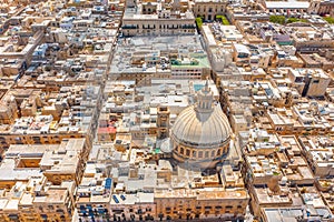 Aerial view dome Lady of Mount Carmel church, St.Paul`s Cathedral in Valletta city center, Malta