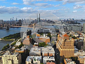 Aerial view of downtown Brooklyn with Hudson River and Brooklyn Bridge on the background. New York City. USA