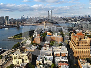 Aerial view of downtown Brooklyn with Hudson River and Brooklyn Bridge on the background. New York City. USA