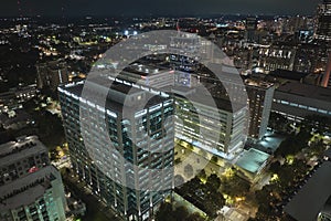 Aerial view of downtown district of Atlanta city in Georgia, USA. Brightly illuminated high skyscraper buildings in