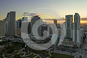 Aerial view of downtown district of of Miami Brickell in Florida, USA at sunset. High skyscraper buildings and street