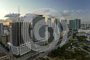 Aerial view of downtown district of of Miami Brickell in Florida, USA at sunset. High skyscraper buildings and street