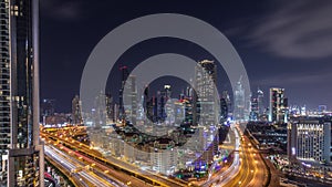 Aerial view on downtown and financial district in Dubai during all night timelapse, United Arab Emirates with